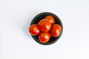 Colorful cherry tomatoes isolated on white for your design