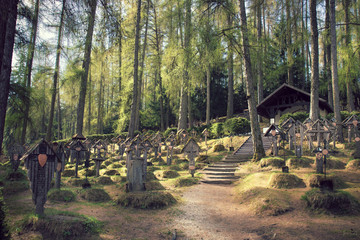cemetery in Brunico (Italy), the tombs are in the wood

