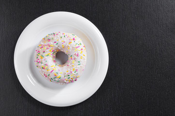 Donut with colorful sprinkles