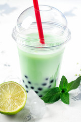 Refreshing homemade iced milky bubble tea with tapioca pearls
