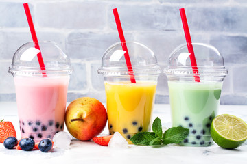 Refreshing homemade iced milky bubble tea with tapioca pearls