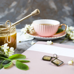 Delicate glass earrings in rustic style with a plant inside. Among the magazine, tea, honey - attributes for woman relaxation