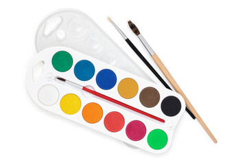 Watercolors and brushes.
