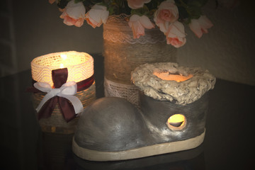 burning candles on a dark vintage background