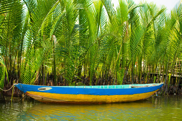 Obraz na płótnie Canvas Tourists visit water coconut forest in Hoi An