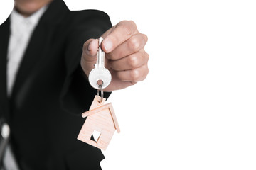 salesman agent exchange key house with customer after agreement contract sale home.