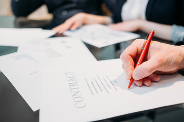 contract signing as a successful result of business negotiation. deal sealing, agreement settlement...