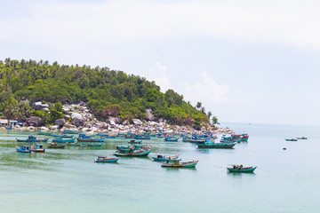 Fototapeta na wymiar Fishing boats at bay in Hon Son Island, Kien Giang, Vietnam