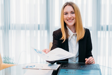job interview. employment and career concept. business woman holding a resume or an application...