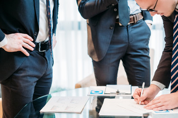 man signing contract closeup. business partnership and cooperation. deal closing and legal...