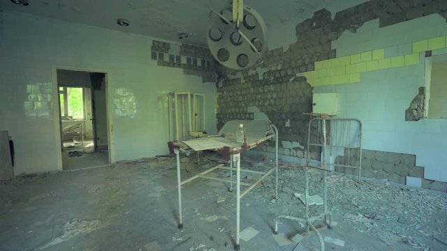 Abandoned hospital, surgery room in Pripyat. Chernobyl nuclear disaster. Slider shot - Juni 2017: 30km Chernobyl, exclusion zone
