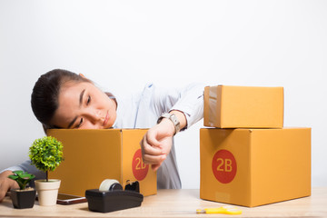 Woman feel tired with box at office