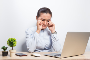 Woman so sad when she look at laptop
