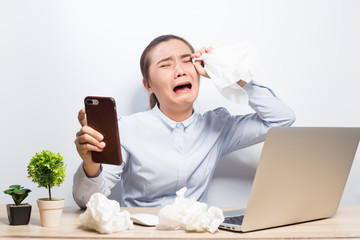 Woman cry when she look at smartphone
