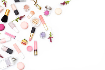 Set of pink decorative cosmetics on white background. Copy space