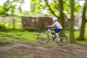 box enjoys jumping with his dirtbike