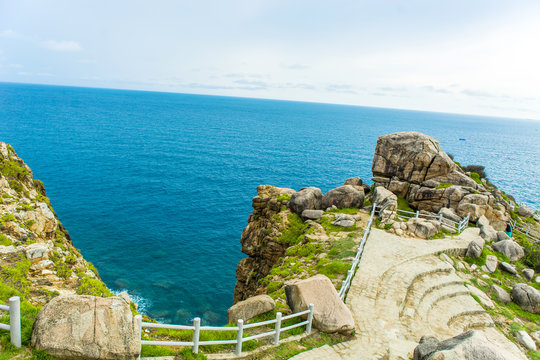 Pristine sea with rocky cliff at Dai Lanh cape point, Mui Dien, Phu Yen province, easternmost of Viet nam