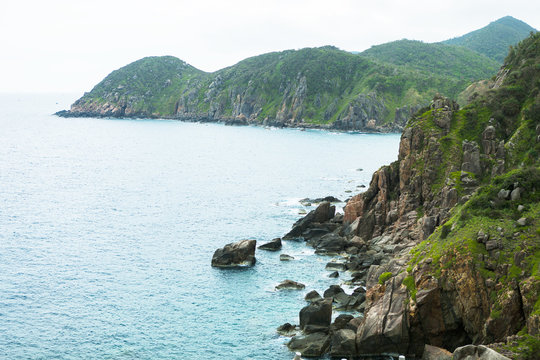 Pristine sea with rocky cliff at Dai Lanh cape point, Mui Dien, Phu Yen province, easternmost of Viet nam