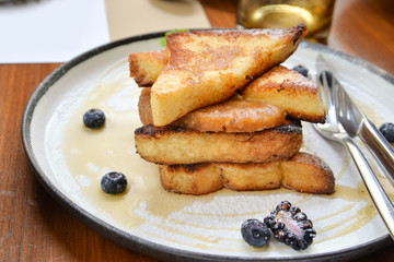 French toast with berry and pineapple  in a plate
