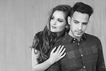 Fashion portrait of a beautiful sexy couple. Black and white image