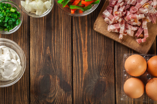 Ingredients for preparing omelette with bacon and vegetables