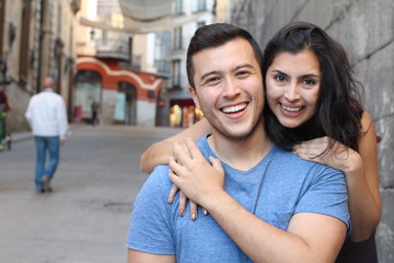 Gorgeous ethnic couple smiling close up