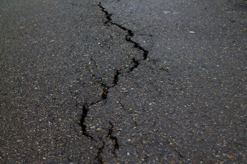 Crack in the road pavement