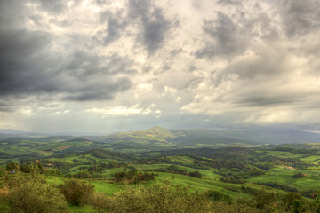 Fototapeta na wymiar hilly Rural mountain landscape in the Italian Tuscany