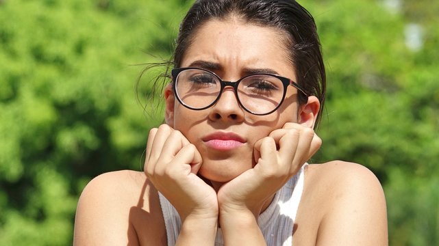 Youthful Female And Confusion