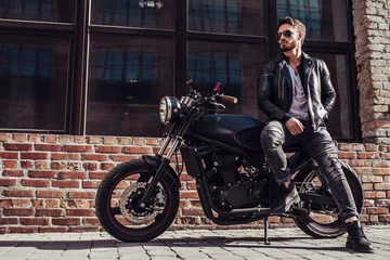 Foto op Plexiglas Biker with modern motorcycle © Vasyl