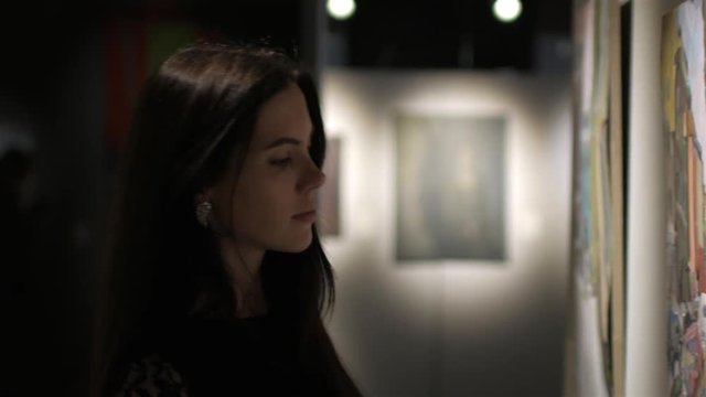 woman in the museum's painting gallery