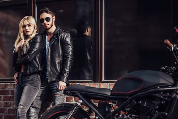 Fototapeta na wymiar Romantic couple with motorcycle