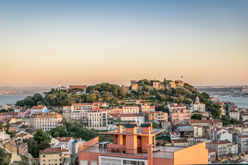 Fototapeta na wymiar A panoramic view of the sunset over the Saint George Castle in Lisbon