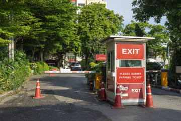 Parking ticket machine and barrier on the car