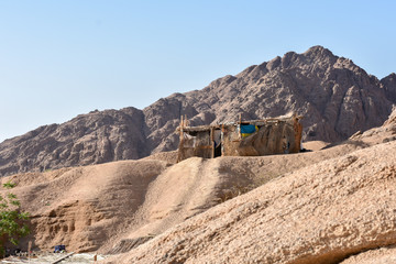 Bedouin house in the desert between the mountains