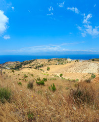 Sea and Sicily island in far, Motta San Giovanni outskirts, Italy