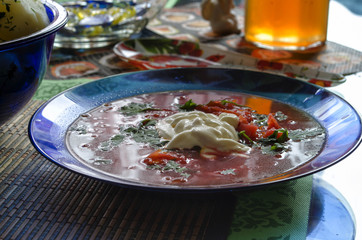Russian cuisine, borsch, potatoes on the table