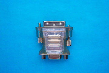 adapter from VGA to DVI on a blue background