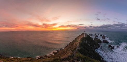 Panorama Nugget Point Lighthouse is famous landmark in south island, New Zealand.