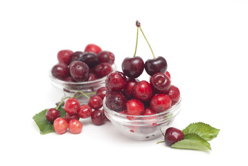 Cherries. Cherry. Cherries in glass bowl and kitchen napkin. Red cherry. Fresh cherries. Cherry on white background. healthy food concept
