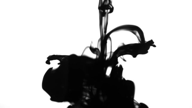 Clouds of black ink on a white background