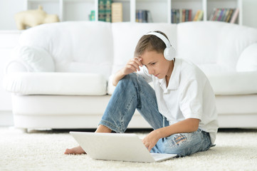 boy using  modern laptop