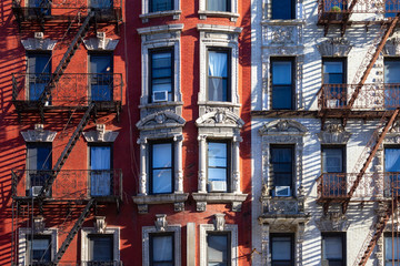 New York City style architecture background with windows and fire escapes