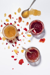 messy jam jars in a sunny setting