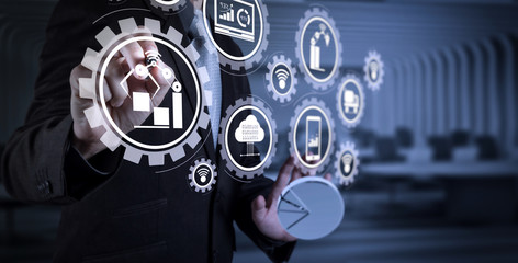 businessman hand writing in the whiteboard