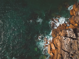 Aerial view of ocean waves and fantastic Rocky coast