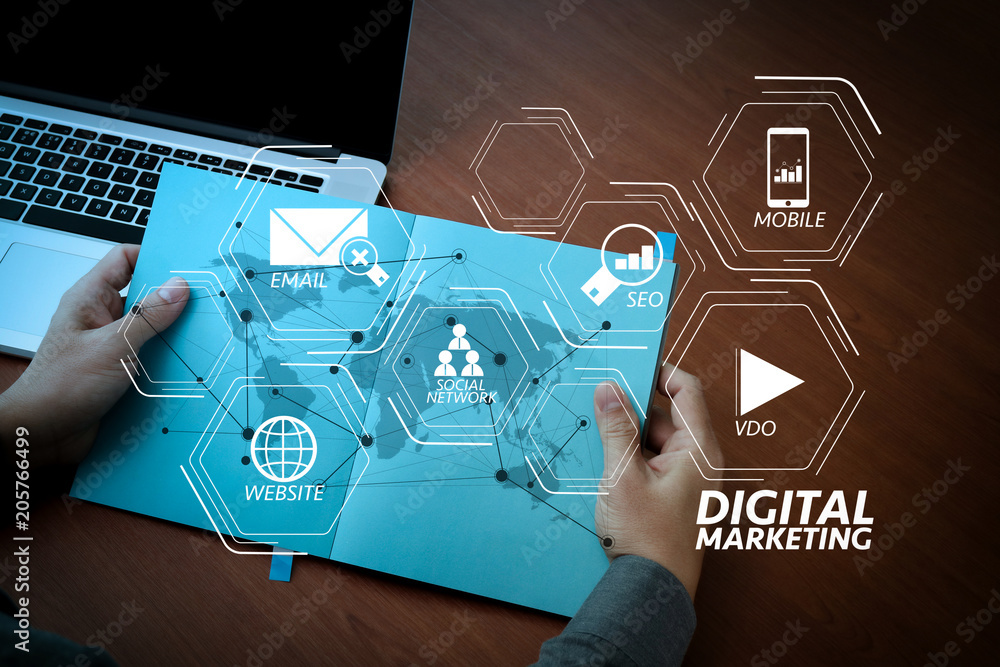 Poster top view of Double exposure of businessman hand working with new modern computer and business strategy as concept