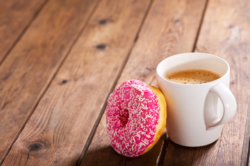 cup of coffee with donut