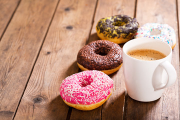 cup of coffee with donuts