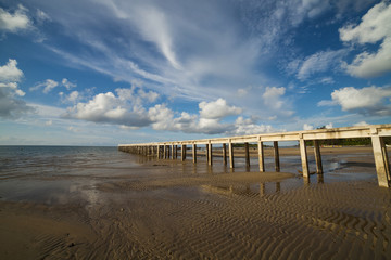 jetty leads out to the sea in daytime, Belitung Indonesia